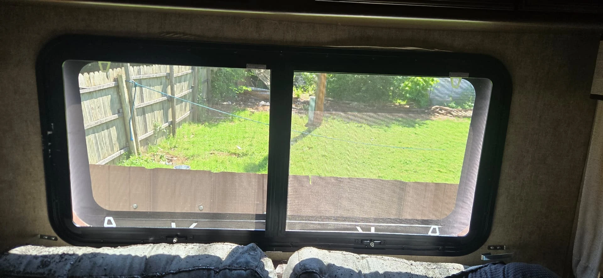 RV window and interior wall in daylight